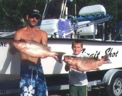 Jessie & Ricky with a couple of snapper they caught in 50 feet of water off of Ft. Pierce.
